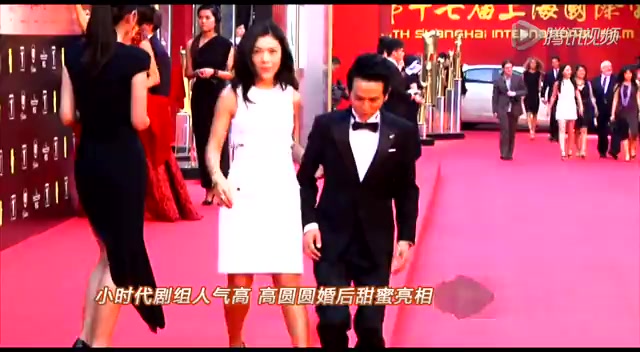 高圆圆婚后首次现身 黑衣裹体笑对镜头一脸喜气