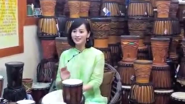 好听,丽江手鼓女孩《我的小宝贝》完整版图片